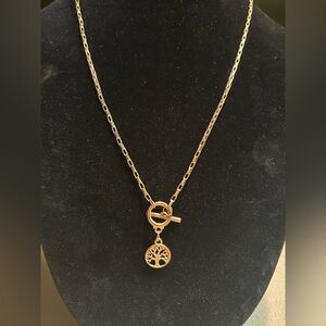 Tree of Life Necklace in Gold Tone. Chain measuring about 24” long​